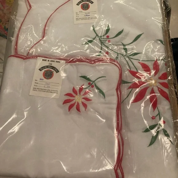 NWT Holiday table clothes in original packing never used